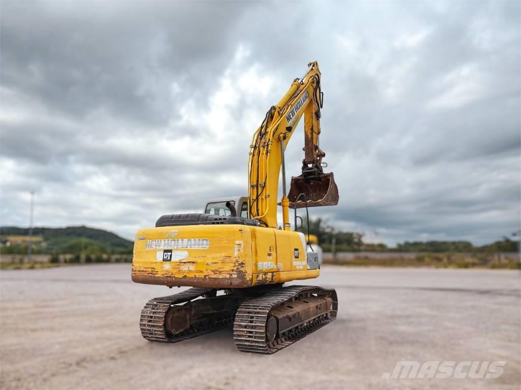 New Holland E 245 B Escavadoras de rastos