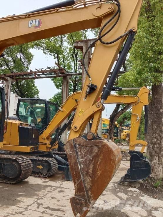 CAT 310 Escavadoras de rastos