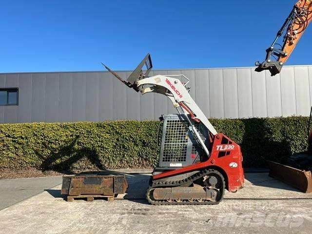 Takeuchi TL 230 Carregadoras de direcção deslizante