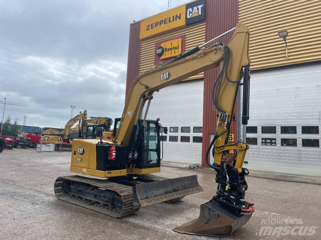 CAT 310 Escavadoras de rastos