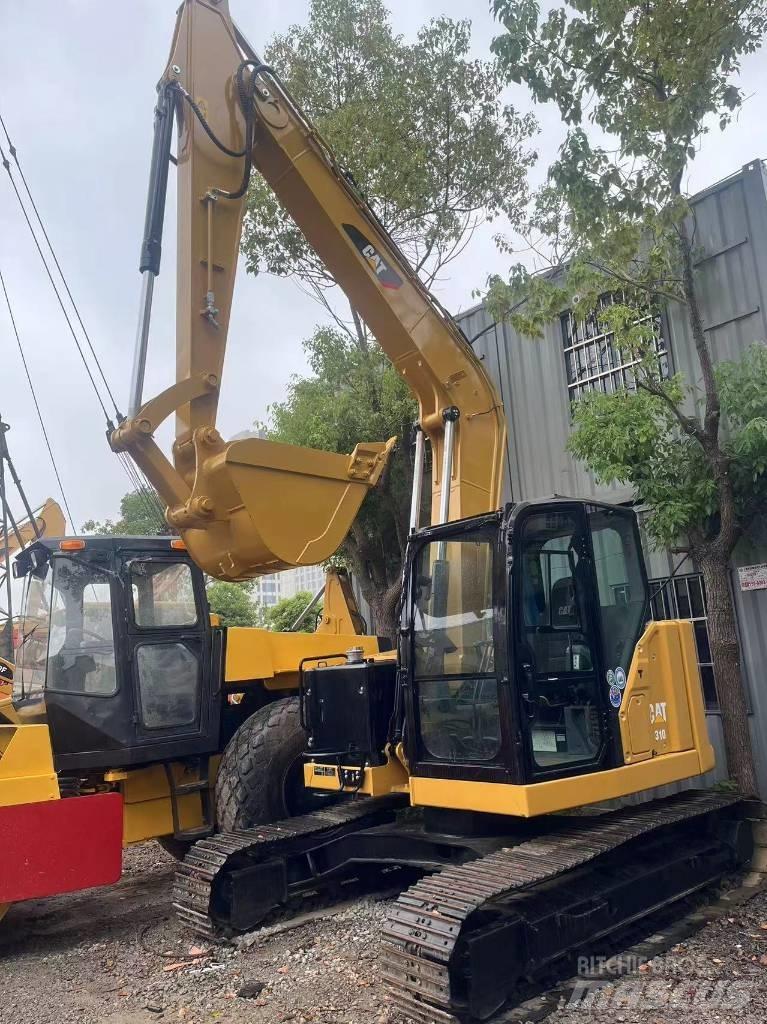 CAT 310 Escavadoras de rastos