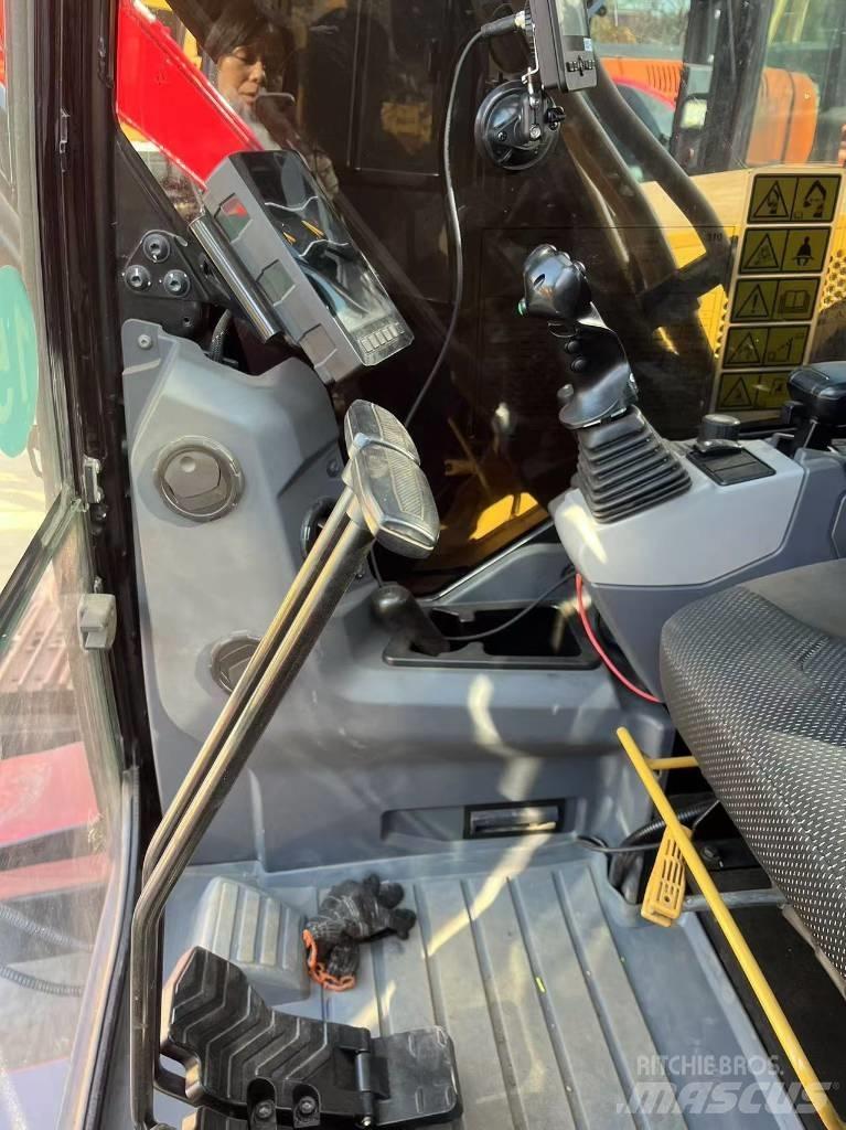 CAT 310 Escavadoras de rastos