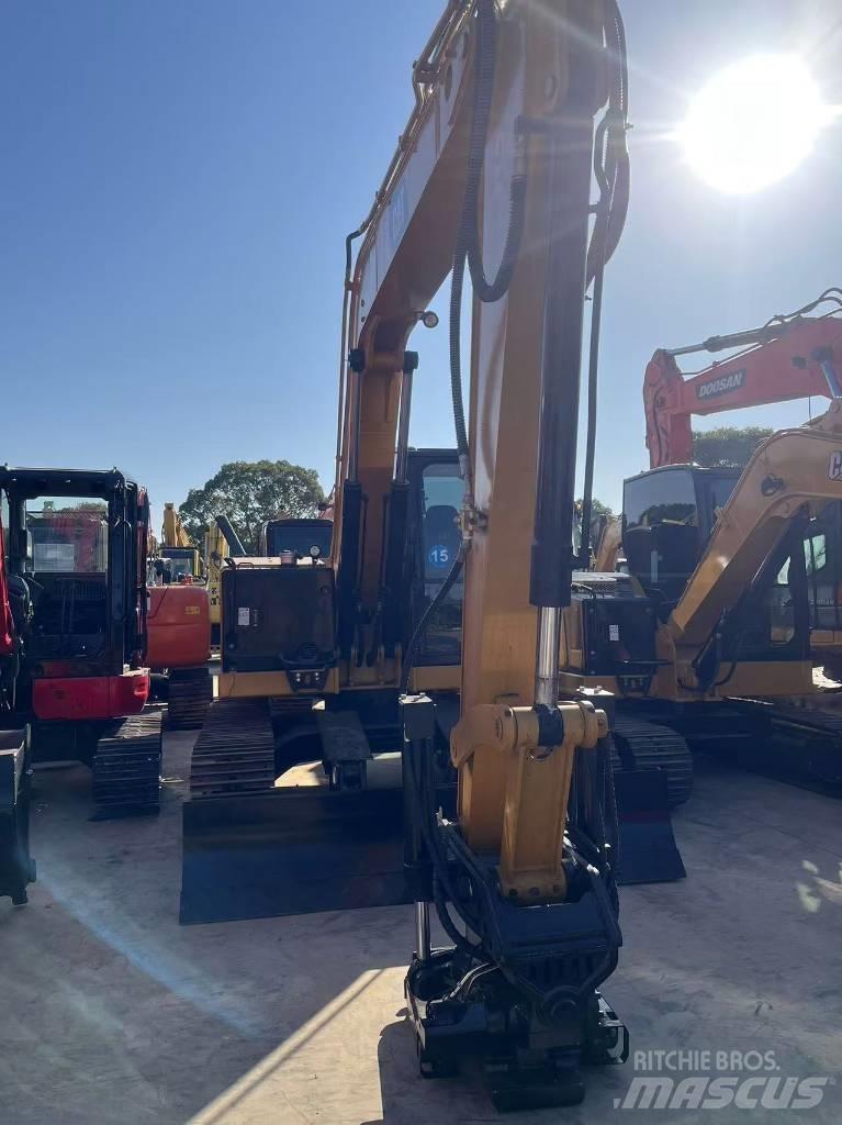 CAT 310 Escavadoras de rastos