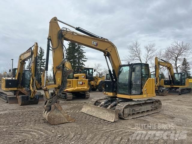 CAT 310 Escavadoras de rastos