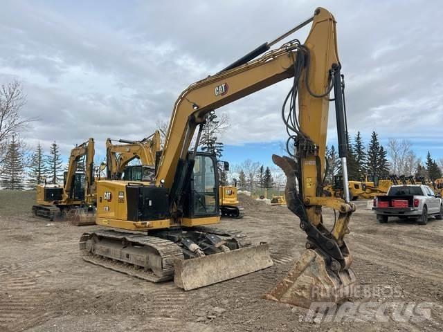 CAT 310 Escavadoras de rastos