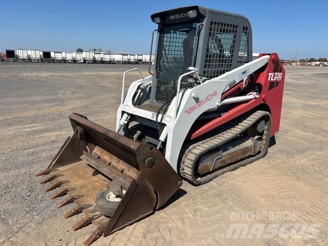 Takeuchi TL230 Carregadoras de direcção deslizante