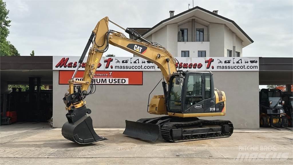 CAT 311D Escavadoras Midi 7t - 12t