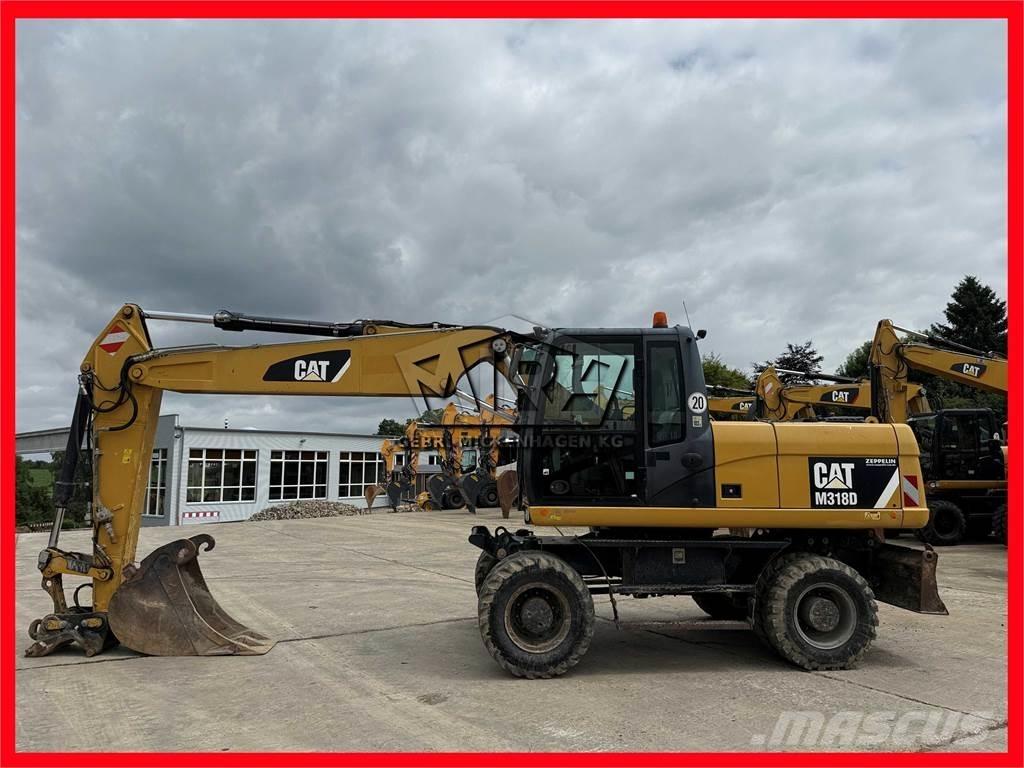 CAT M 318 D Escavadoras de rodas