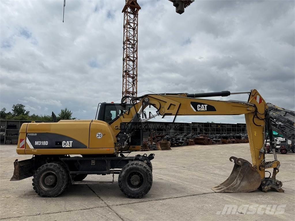CAT M 318 D Escavadoras de rodas