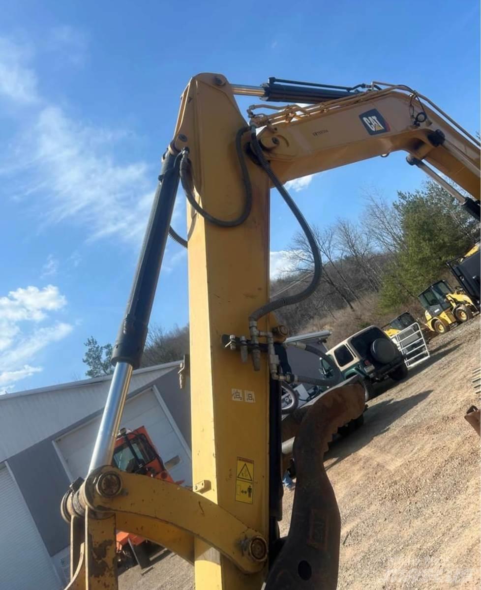 CAT 310 Escavadoras de rastos
