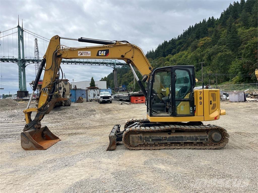 CAT 310 Escavadoras de rastos