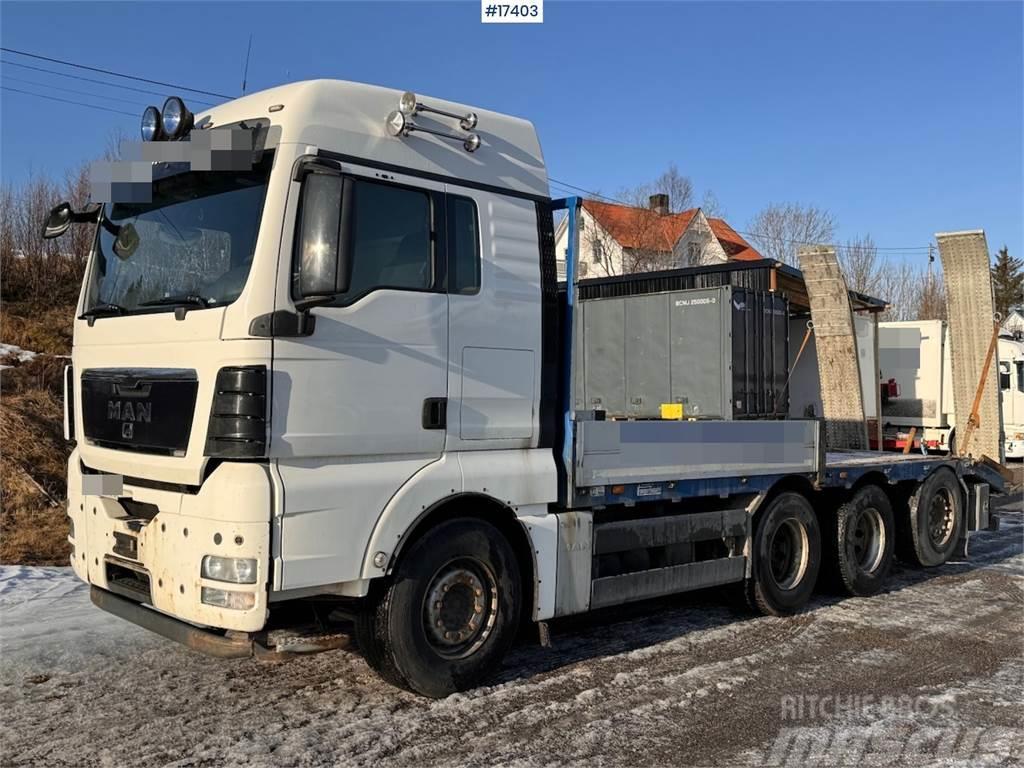 MAN TGX 35.480 8x4 flatbed truck w/ driving bridges Camiões estrado/caixa aberta