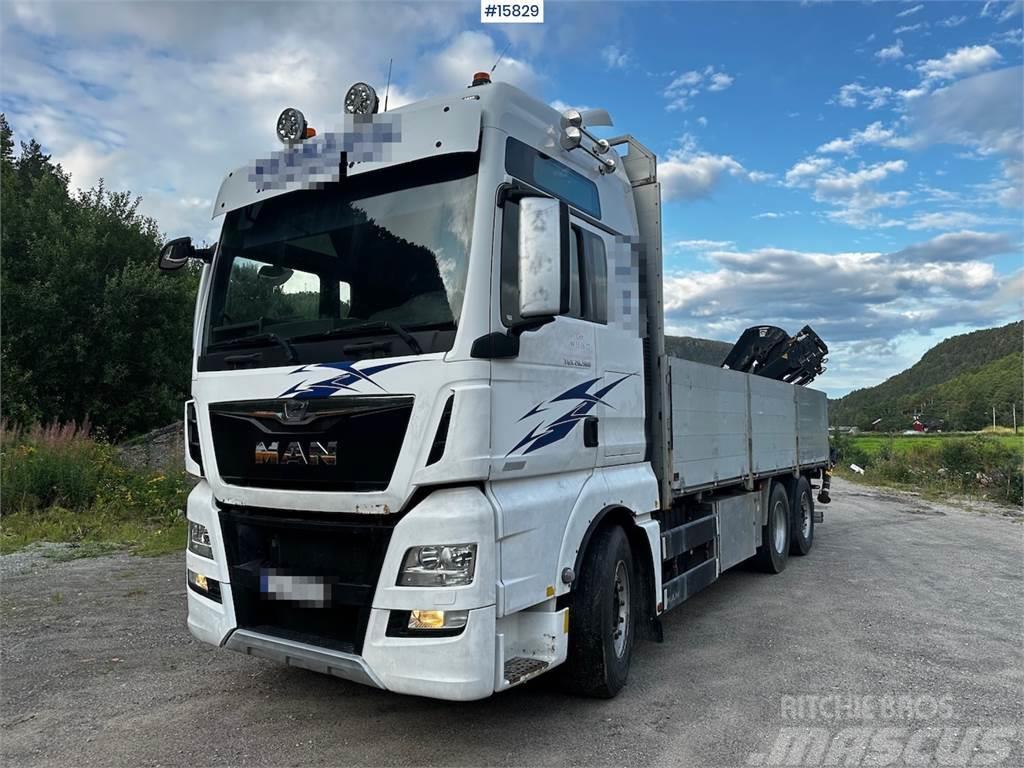 MAN TGX 26.560 Flatbed truck with Hiab 138 crane from  Camiões estrado/caixa aberta
