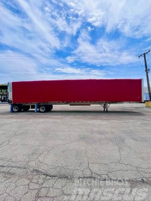 East Mfg FLATBED WITH ROLLING TARP Reboques de cortinas laterais