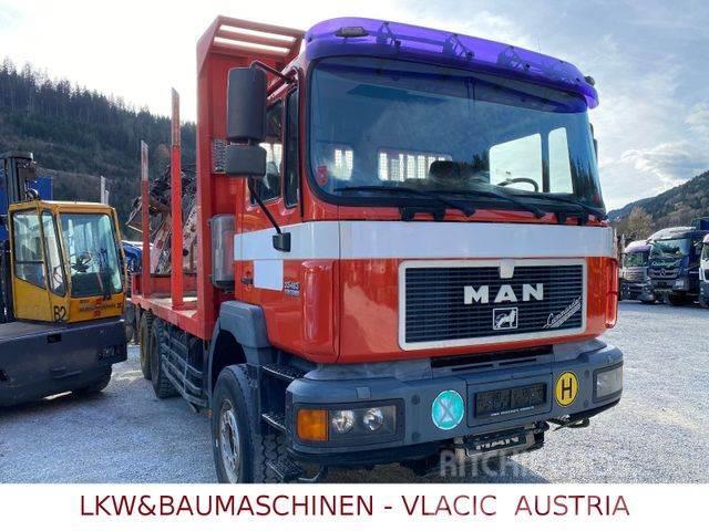 MAN 33.403 Holztransporter mit Kran PENZ Camiões de transporte de troncos